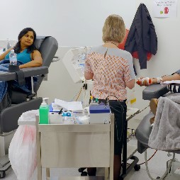 Donors in chair donating at donor centre