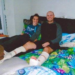Blood transfusion recipient Teresa and her partner sat up on bed