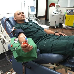 Paramedic Wes on the chair donating blood