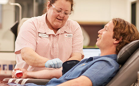 a nurse attending to a donor
