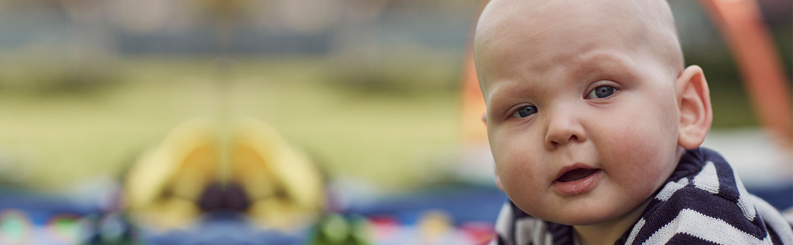 close up of a baby looking at the camera