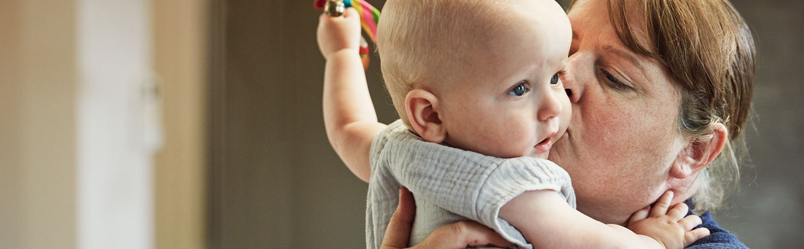 close up of a mother holding her baby