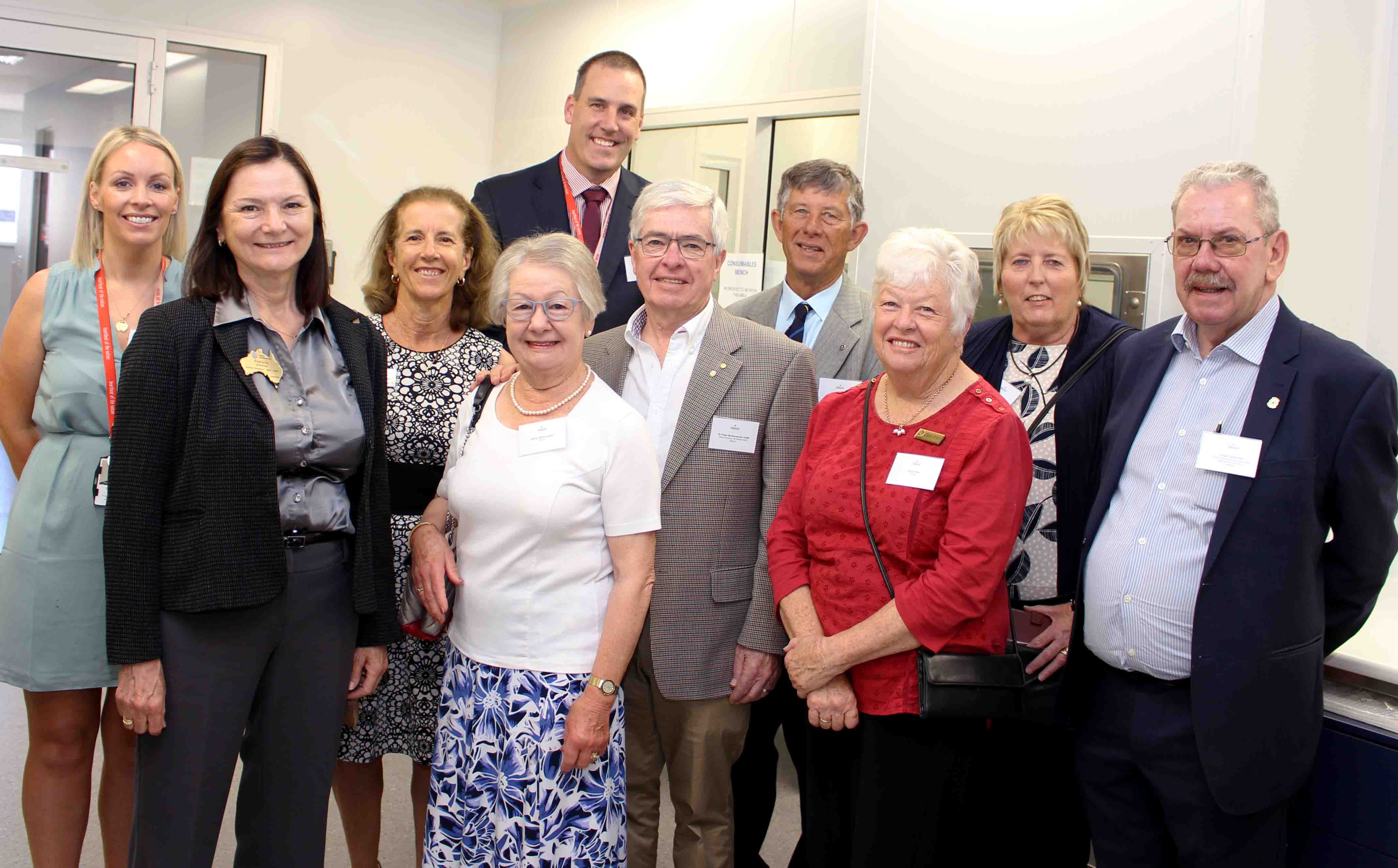 group photo of Rotarians in microbiome laboratory