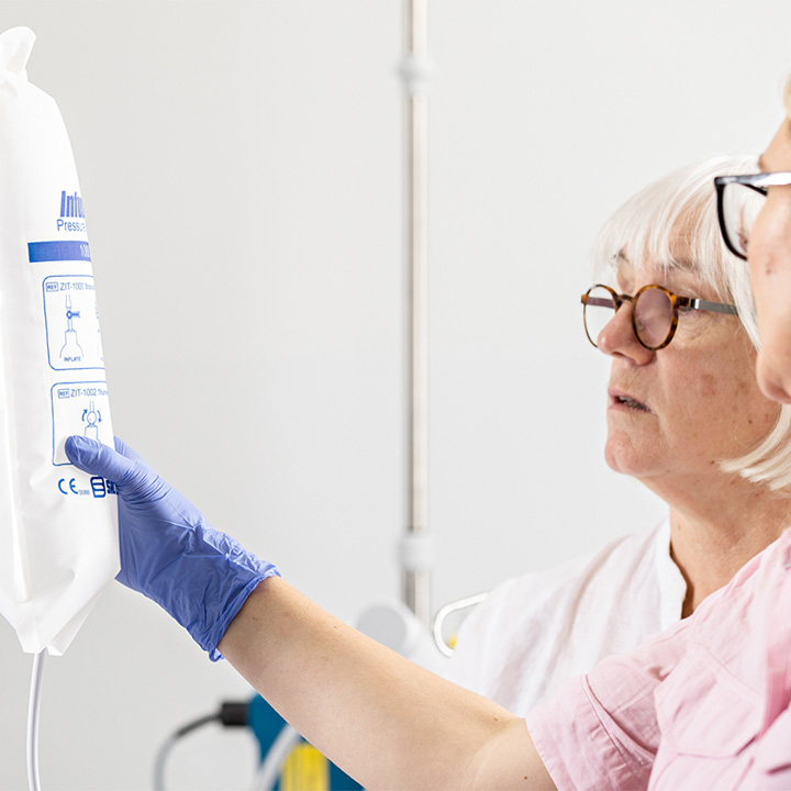 nurses checking blood bag