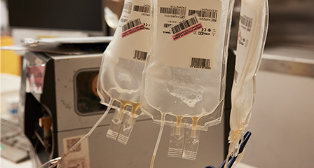 image of a blood component bags in front of machine