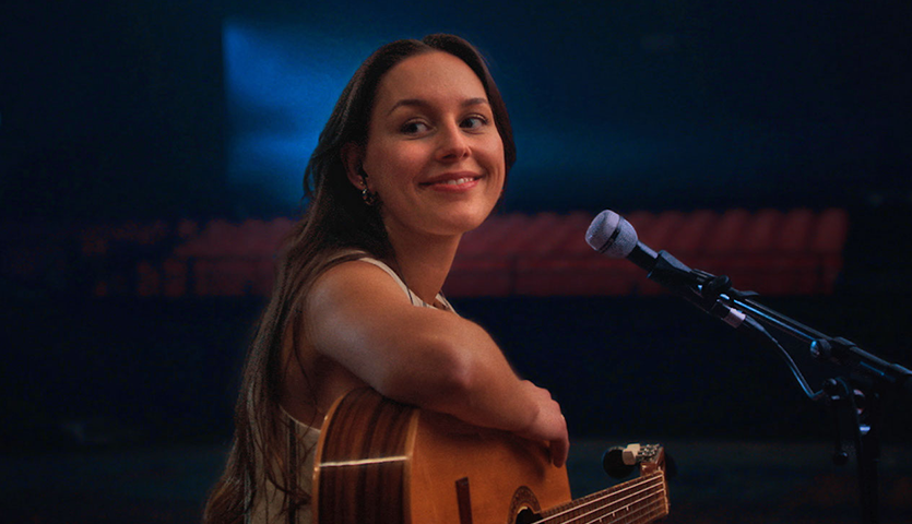 Woman playing guitar 