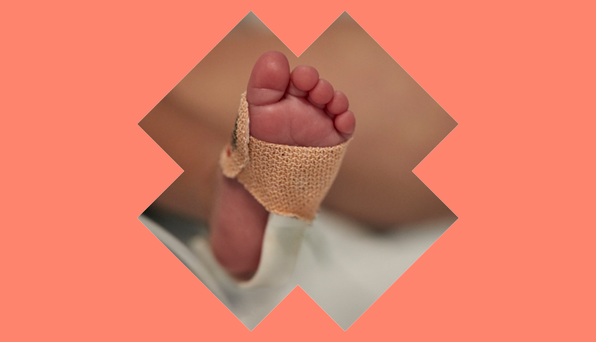 Infant's foot in medical setting 