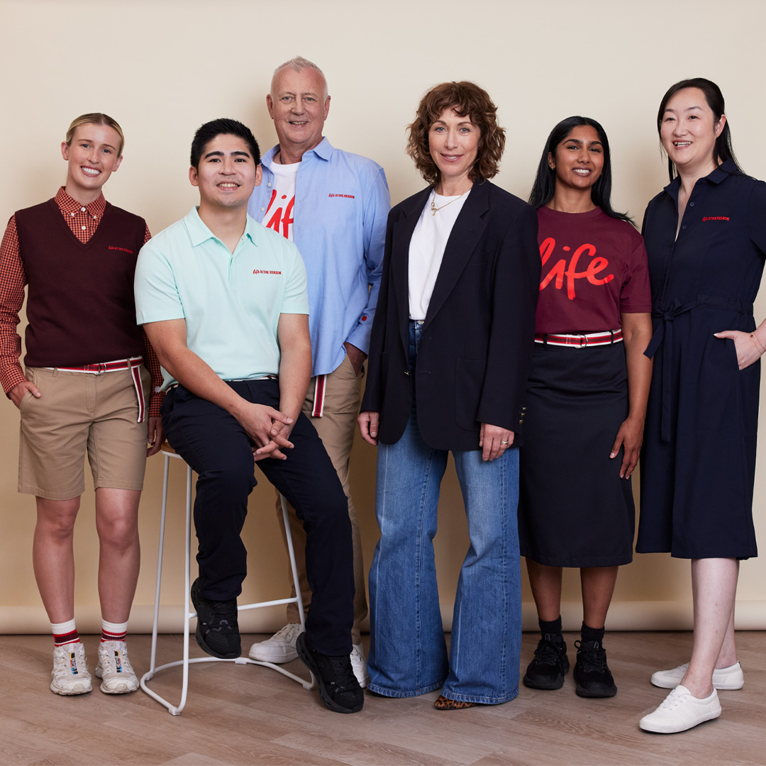 Image of Lifeblood team members in the new uniform capsule collection with the designer Lisa Gorman
