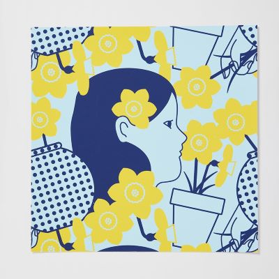 image of Beci Orpin's design, it includes a woman in profile and a potplant in dark blue with yellow daffodils on a light blue background