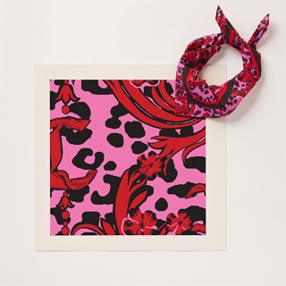 photo of the camilla franks designed bandage, it's pink and black animal print with red patterns over the top