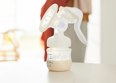Breast milk pump with milk