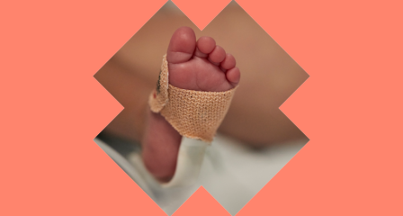 Infant's foot in medical setting 