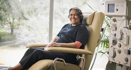 Cathy freeman sitting in a donor chair