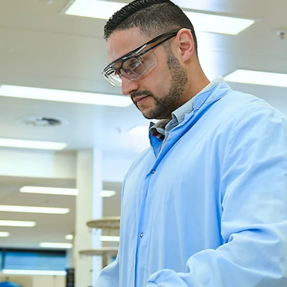 image of a scientist scanning a donation