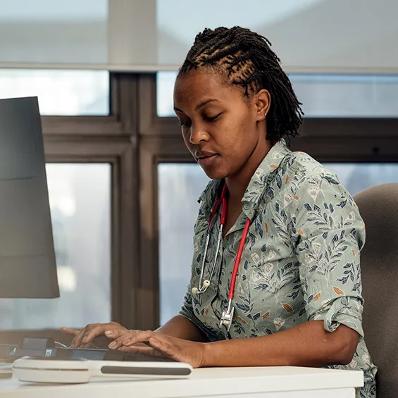 image of woman in front of computer