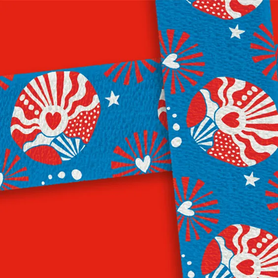 a blue bandage with a red and white design on a red background