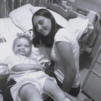 woman-with-girl-in-hospital-bed
