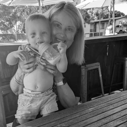 grandmother holding her grandson