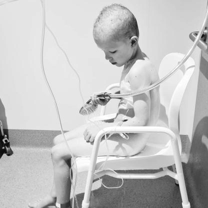 Young boy in hospital shower