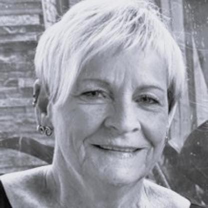 Photo of a woman with short grey hair