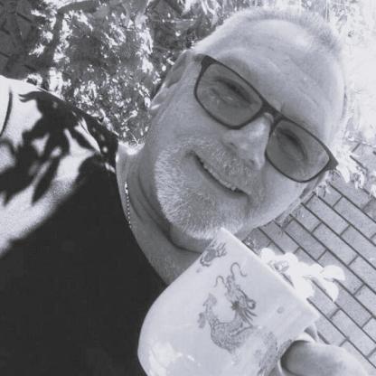 A man smiling at the camera