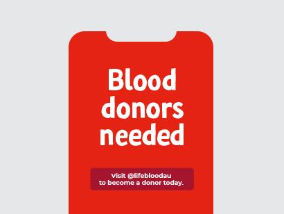 Red tile with "blood donors needed" written