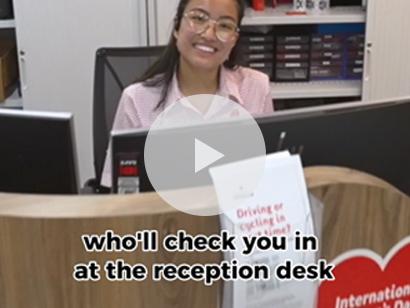 image of Lifeblood staff member at a donor centre reception desk