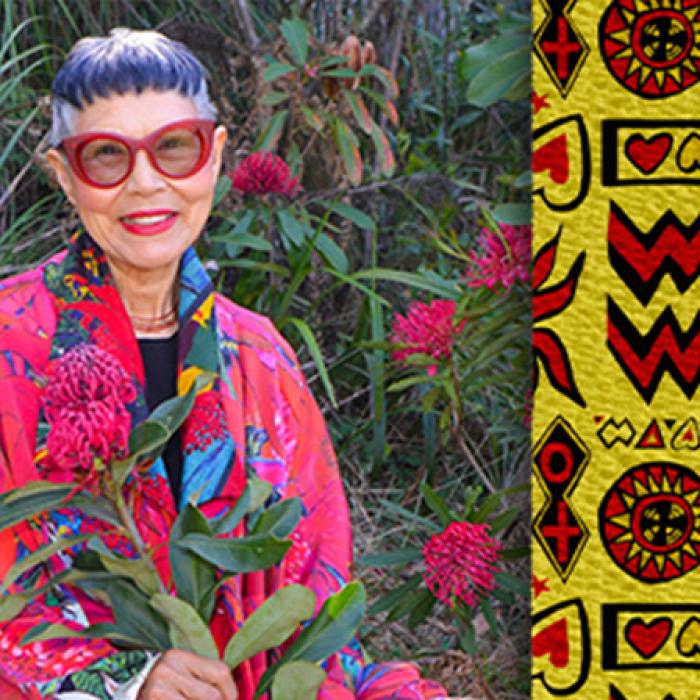 photo of artist jenny kee wearing bright clothes and red glasses, on the right is the bandage she designed, it is yellow with red and black coloured symbols