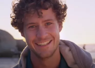 Man smiling at the camera, a still from a Lifeblood video.
